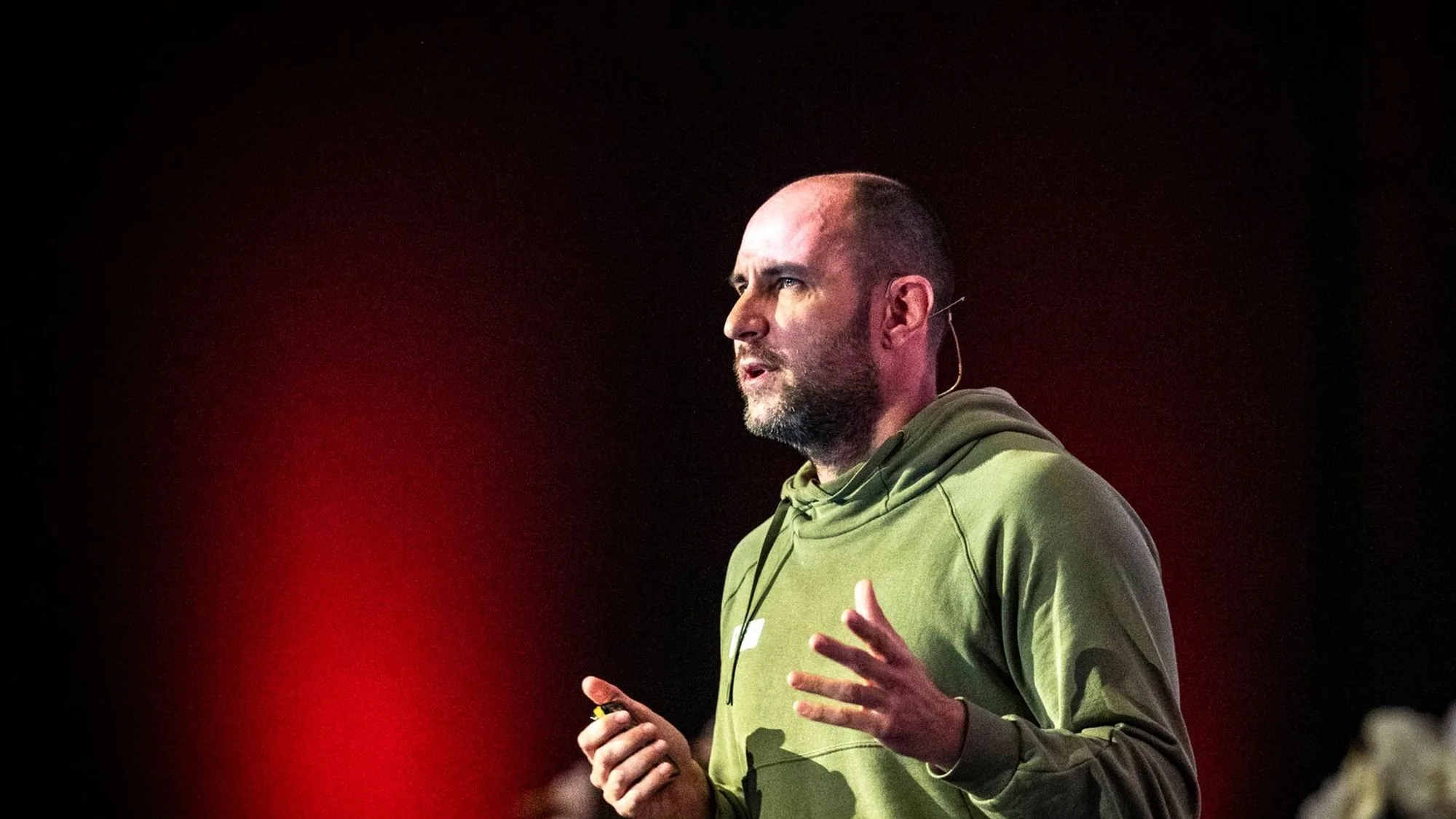 Seva Krutko speaking on stage