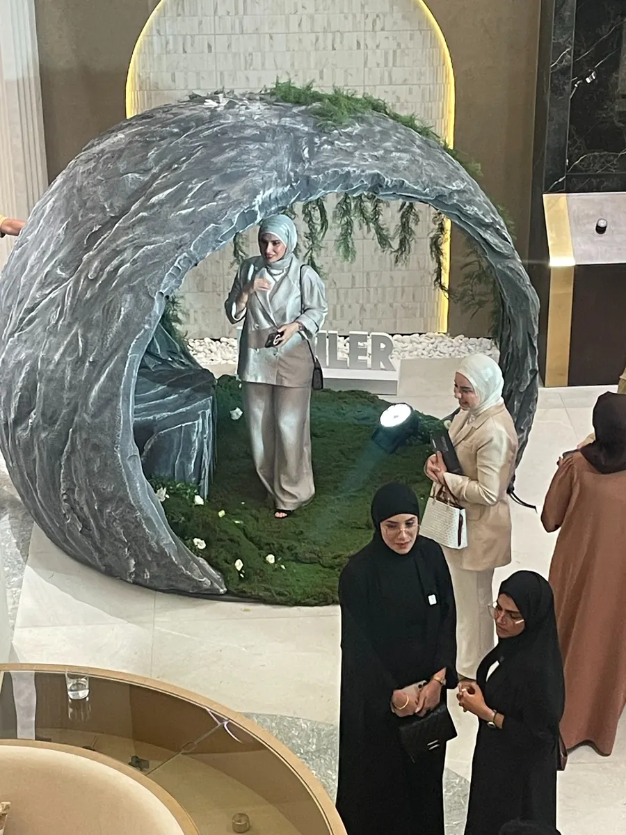 The cave photo booth in use at the opening